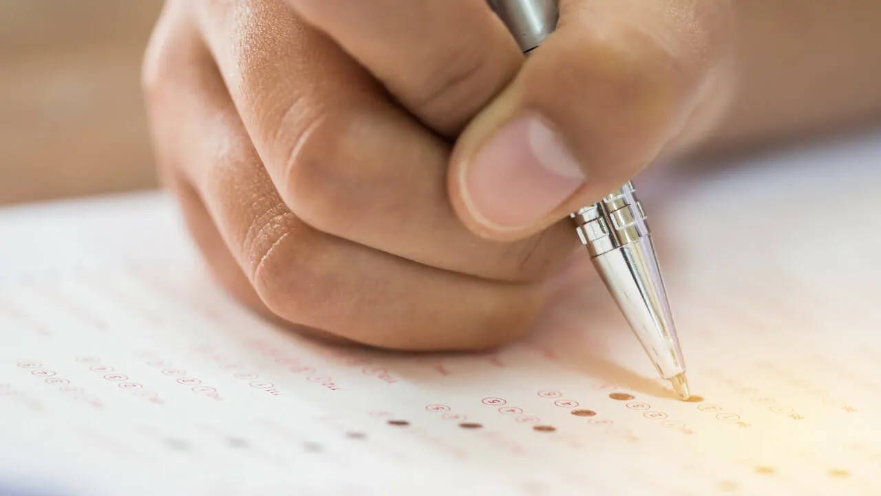 Patient filling out clinical trial form